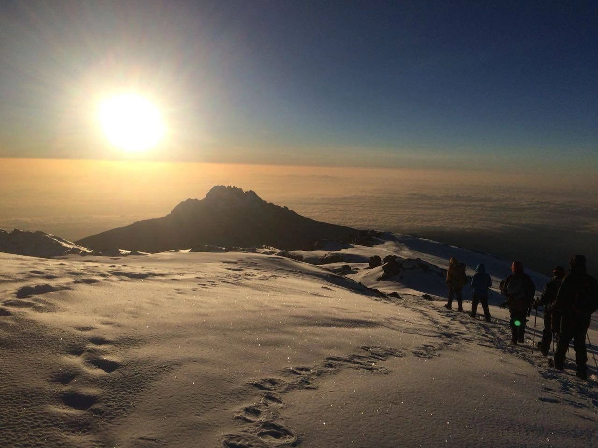 Sunrise over a snowy mountain landscape, from Tribe Coffee's original website