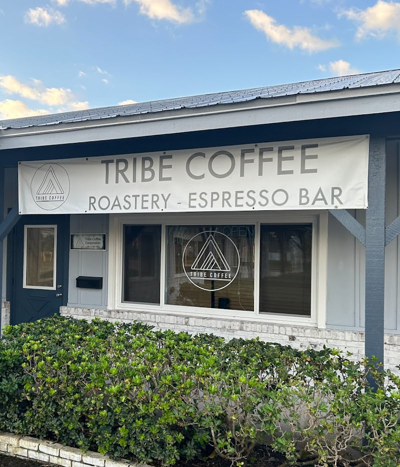 Tribe Coffee’s Vero Beach storefront, with its roastery and espresso bar sign above the entrance